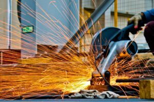 machinist cutting metal to protect the owners investment