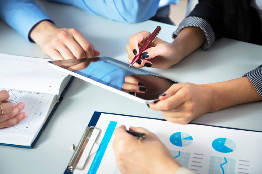 people using facility management software