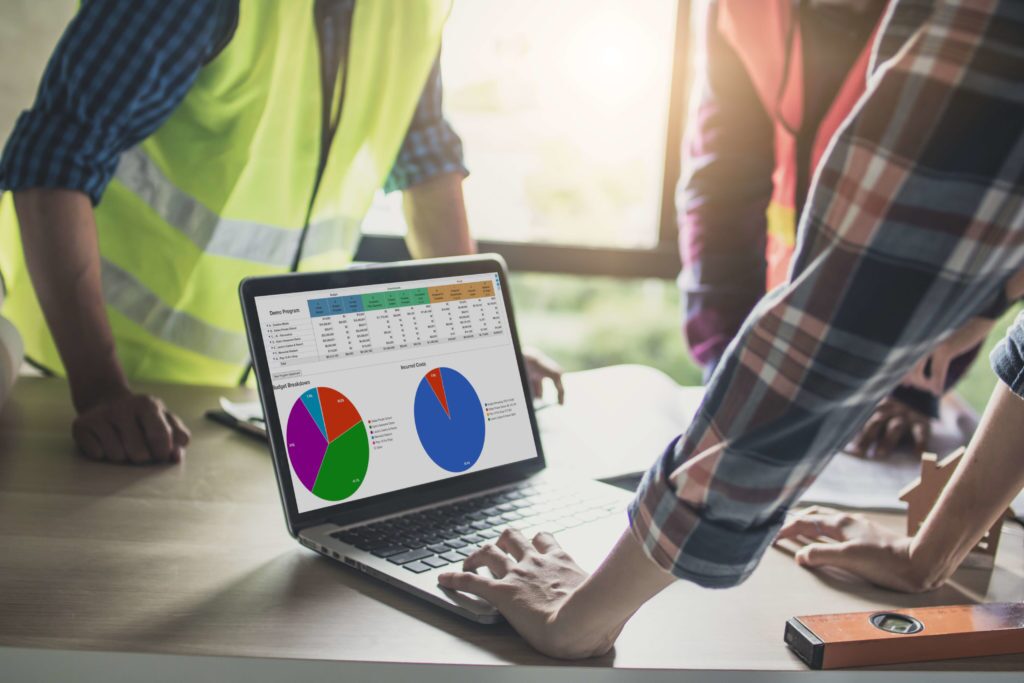 men using owner insite construction project management software